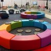 Swerve Benches in colorful circle with Anthracite Color Rad Pad Cushions